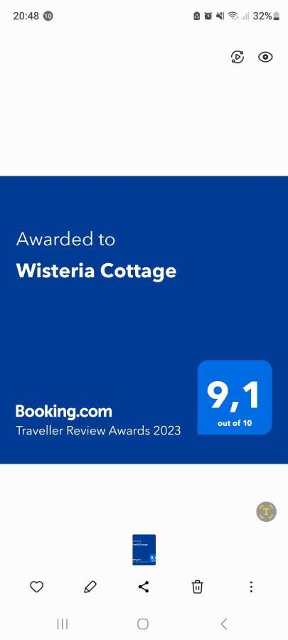 Wisteria Cottage Fleurines 外观 照片